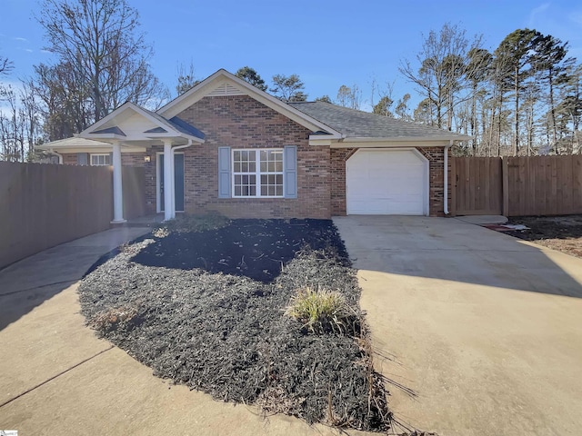 single story home featuring a garage