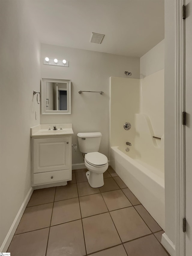 full bathroom with toilet, vanity, tile patterned floors, and  shower combination