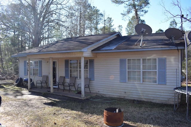 view of front facade featuring a patio area and a trampoline