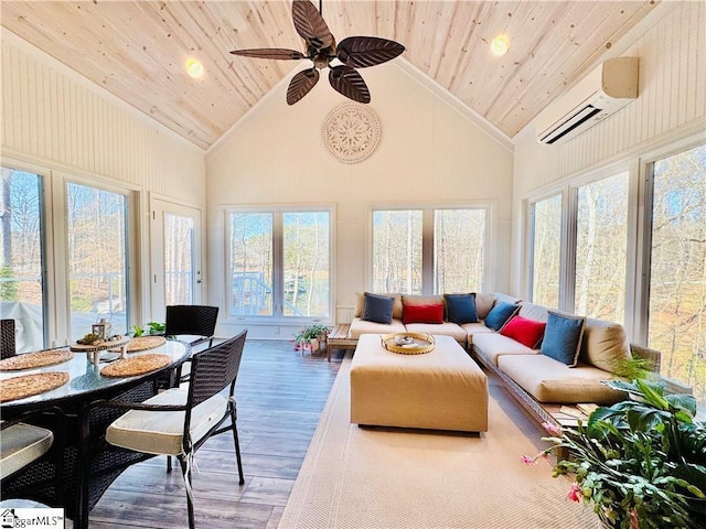 sunroom with lofted ceiling, a wall mounted AC, ceiling fan, and wooden ceiling