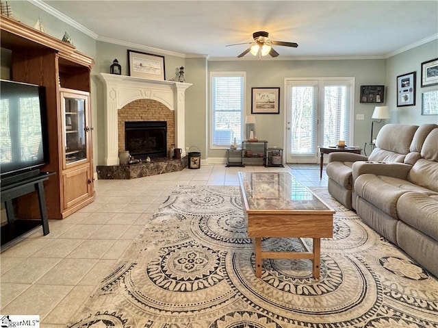 tiled living room with ceiling fan and crown molding