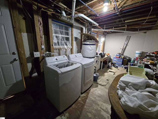 washroom featuring washing machine and dryer