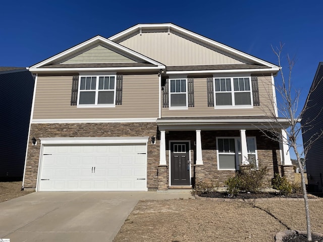 craftsman inspired home with covered porch and a garage