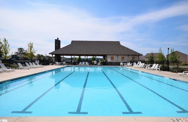 view of pool featuring a gazebo and a patio