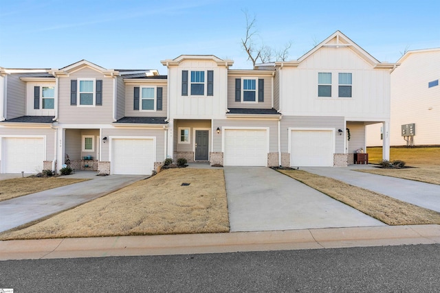 view of property with a front lawn, central AC, and a garage