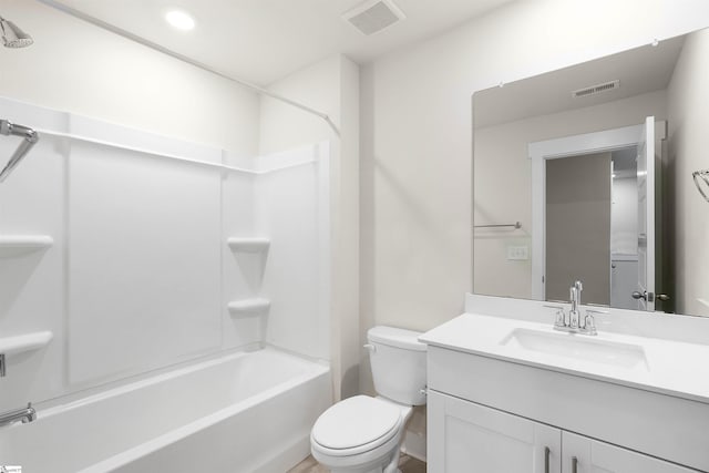 full bathroom with bathing tub / shower combination, vanity, and toilet