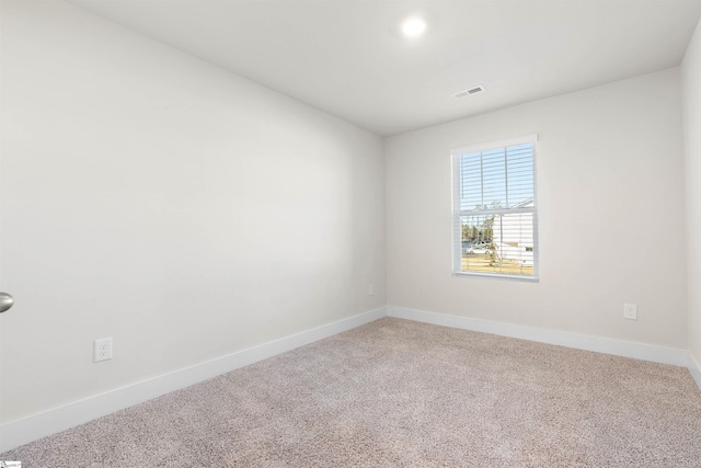 unfurnished room featuring carpet floors