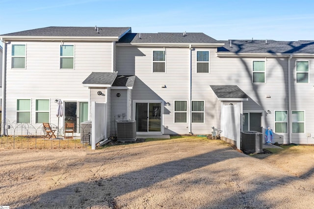 back of property featuring central AC unit