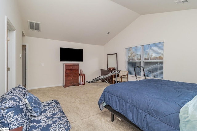 carpeted bedroom with vaulted ceiling