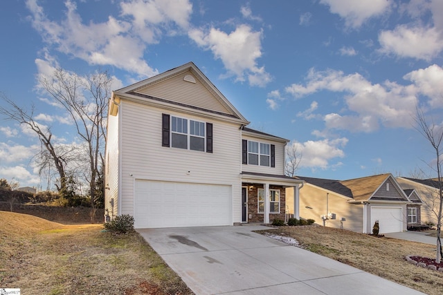 view of front property featuring a porch, a front lawn, and a garage