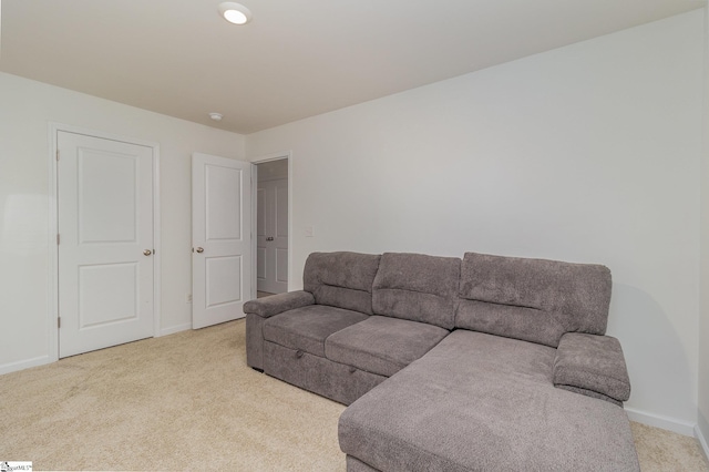 living room with light colored carpet