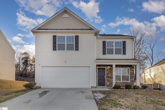 front of property with a garage