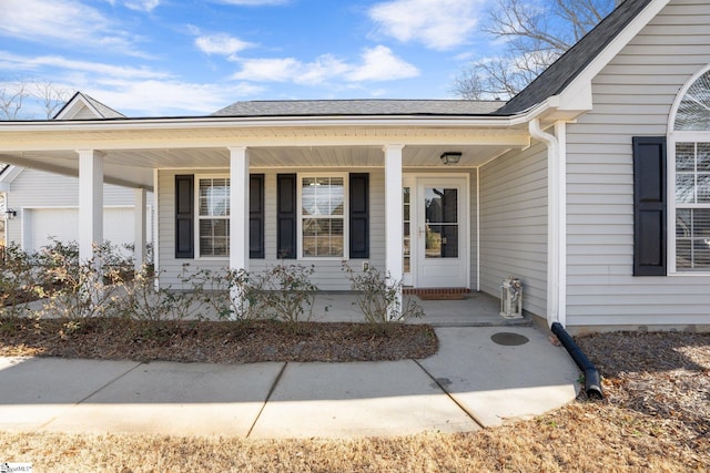 property entrance with covered porch