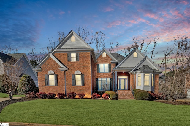 view of front property with a lawn