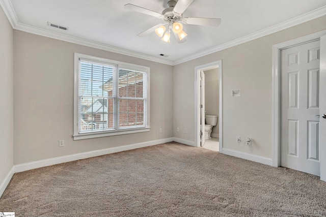 unfurnished bedroom featuring ceiling fan, light colored carpet, connected bathroom, and ornamental molding