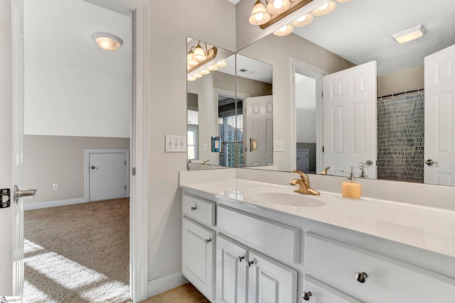 bathroom with vanity and walk in shower