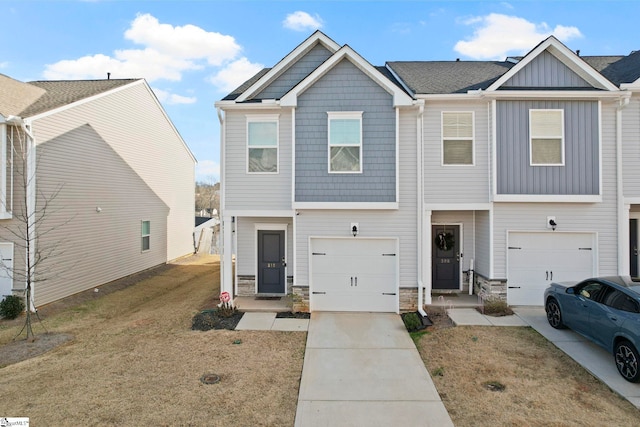 view of front facade with a front lawn and a garage