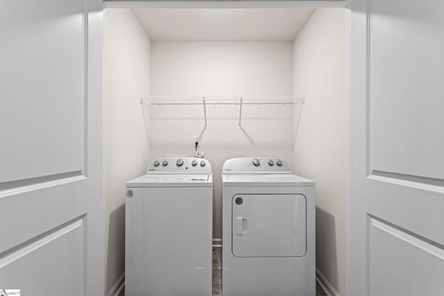 washroom featuring independent washer and dryer