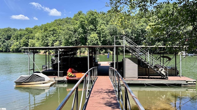 view of dock with a water view