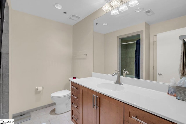 bathroom with toilet, a shower, tile patterned floors, and vanity