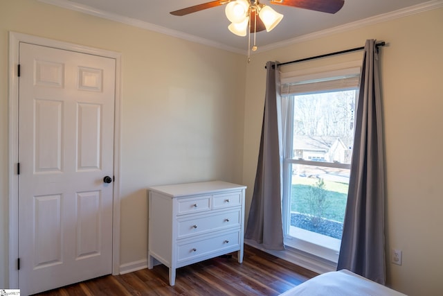 bedroom with ceiling fan, crown molding, and dark hardwood / wood-style floors