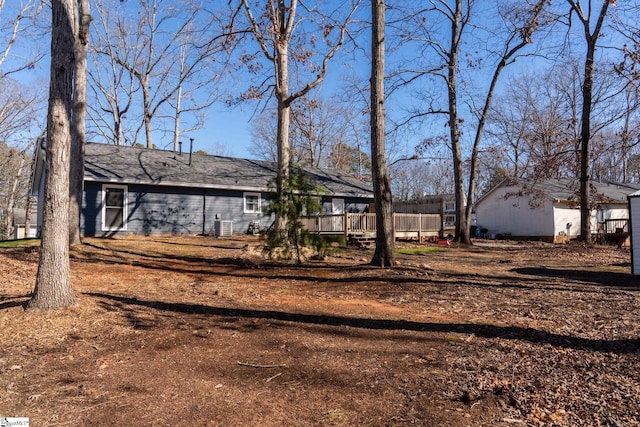 exterior space featuring cooling unit and a trampoline