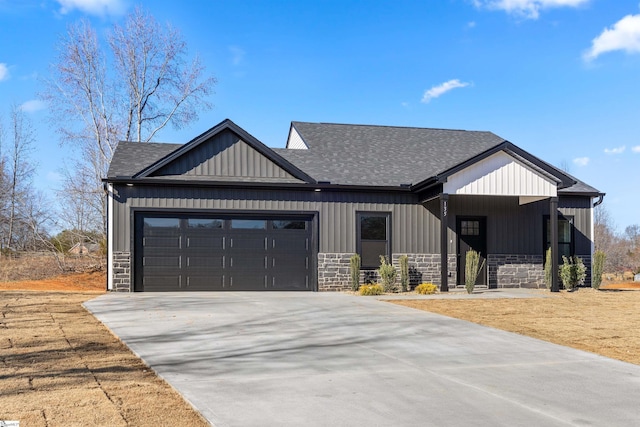 modern inspired farmhouse with a garage