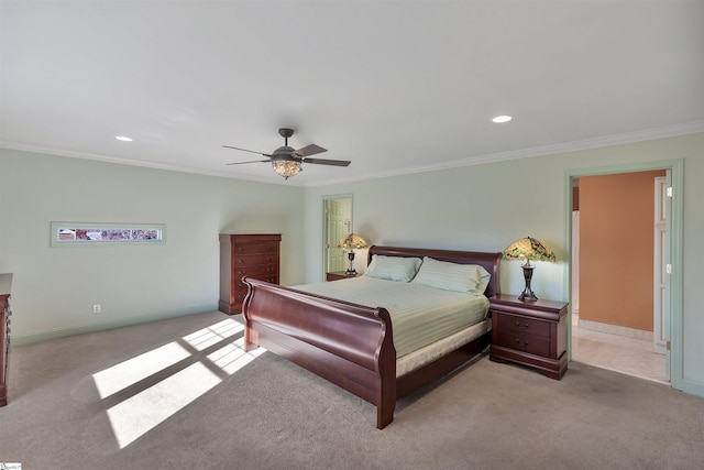 carpeted bedroom featuring ornamental molding and ceiling fan