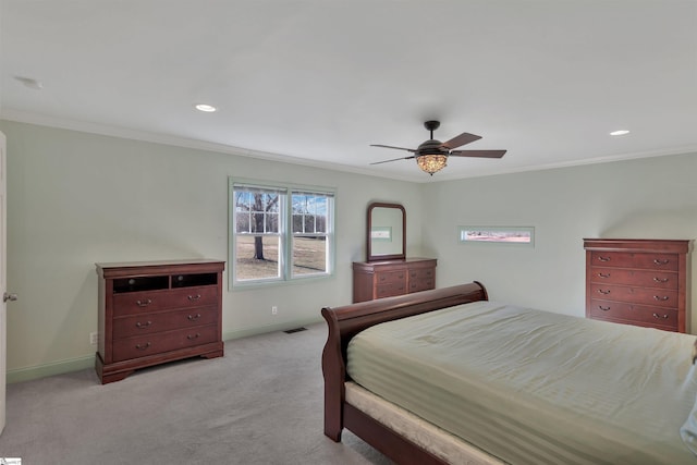 bedroom featuring ceiling fan, ornamental molding, and light carpet