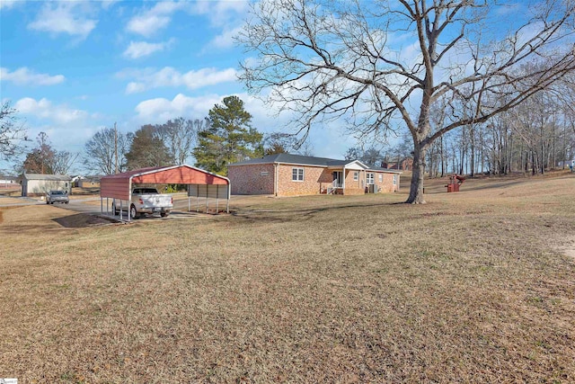 view of yard featuring a carport