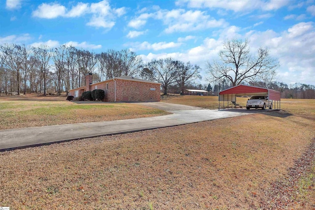 view of yard with a carport