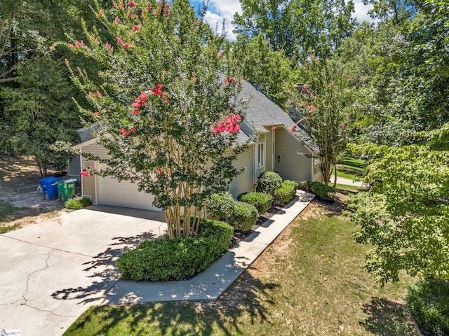 view of side of property with a garage