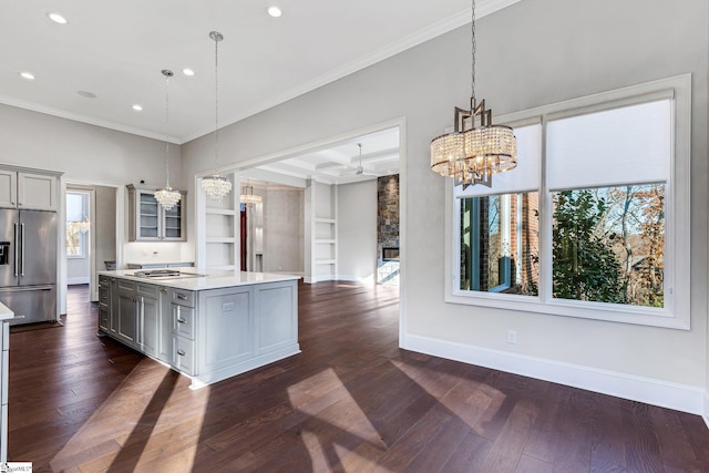 kitchen featuring gray cabinetry, stainless steel appliances, and pendant lighting