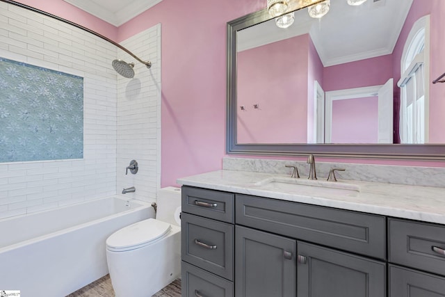 full bathroom with toilet, tiled shower / bath combo, crown molding, and vanity