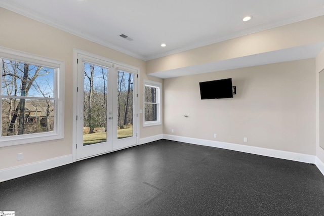 interior space with ornamental molding and french doors