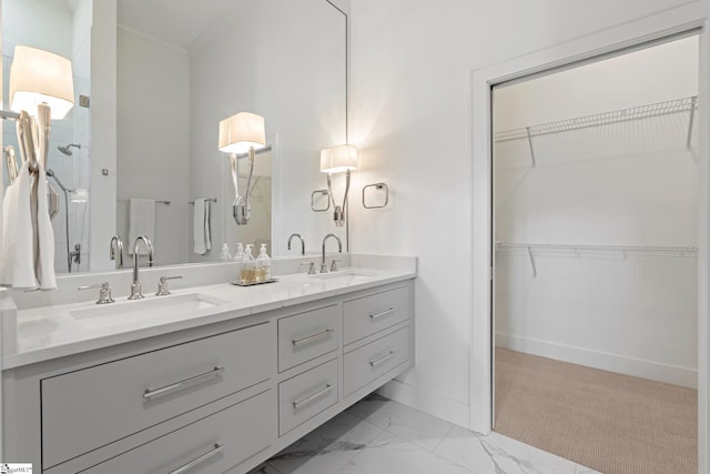 bathroom featuring vanity and ornamental molding