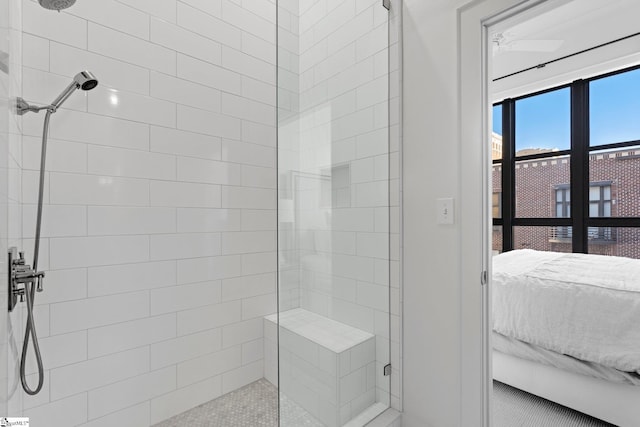 bathroom featuring tiled shower