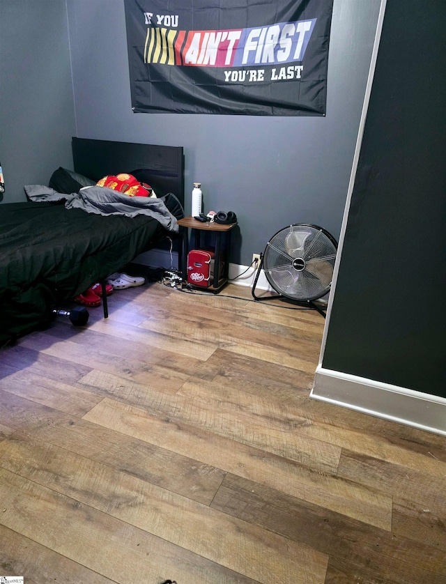 bedroom featuring wood-type flooring