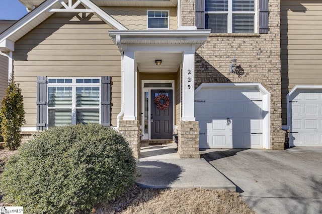 entrance to property featuring a garage