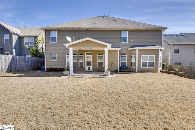 rear view of house with a patio area