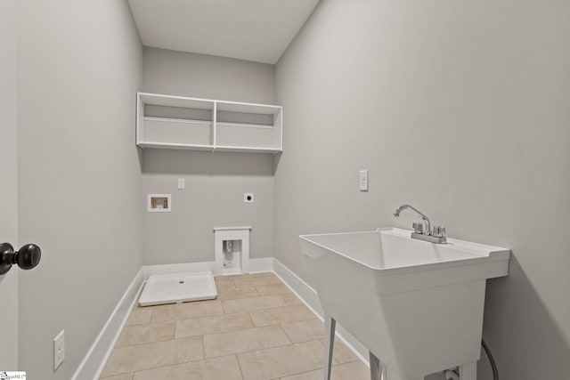 clothes washing area with washer hookup, sink, light tile patterned flooring, and electric dryer hookup