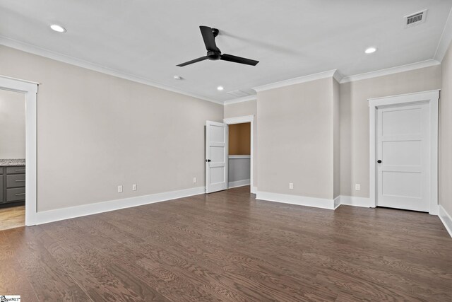 interior space featuring ceiling fan, dark wood-type flooring, and ornamental molding