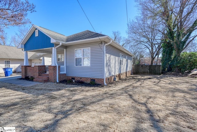 view of property exterior with covered porch