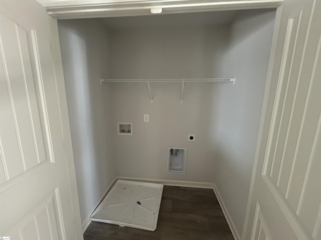 clothes washing area featuring electric dryer hookup, dark hardwood / wood-style floors, and washer hookup