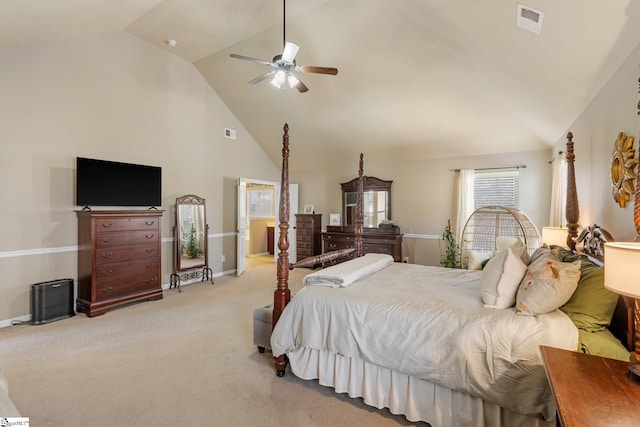 bedroom featuring vaulted ceiling, ceiling fan, and light carpet