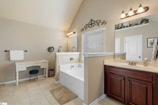 bathroom with a bathtub, vaulted ceiling, tile patterned floors, and vanity