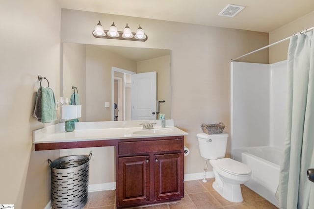 full bathroom featuring toilet, vanity, tile patterned floors, and shower / bath combination with curtain