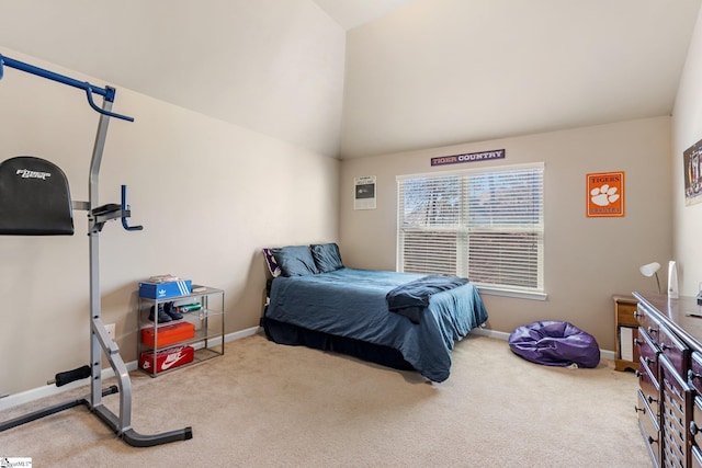 bedroom with lofted ceiling and carpet floors