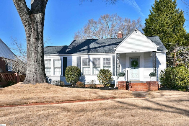 ranch-style house with a front lawn