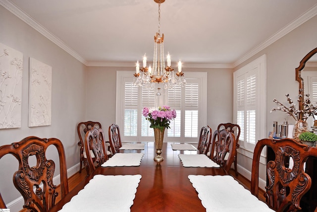 dining room featuring an inviting chandelier, crown molding, and dark hardwood / wood-style floors